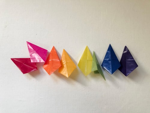 Step 8: All 8 Colored Kite Paper folded into kite shape