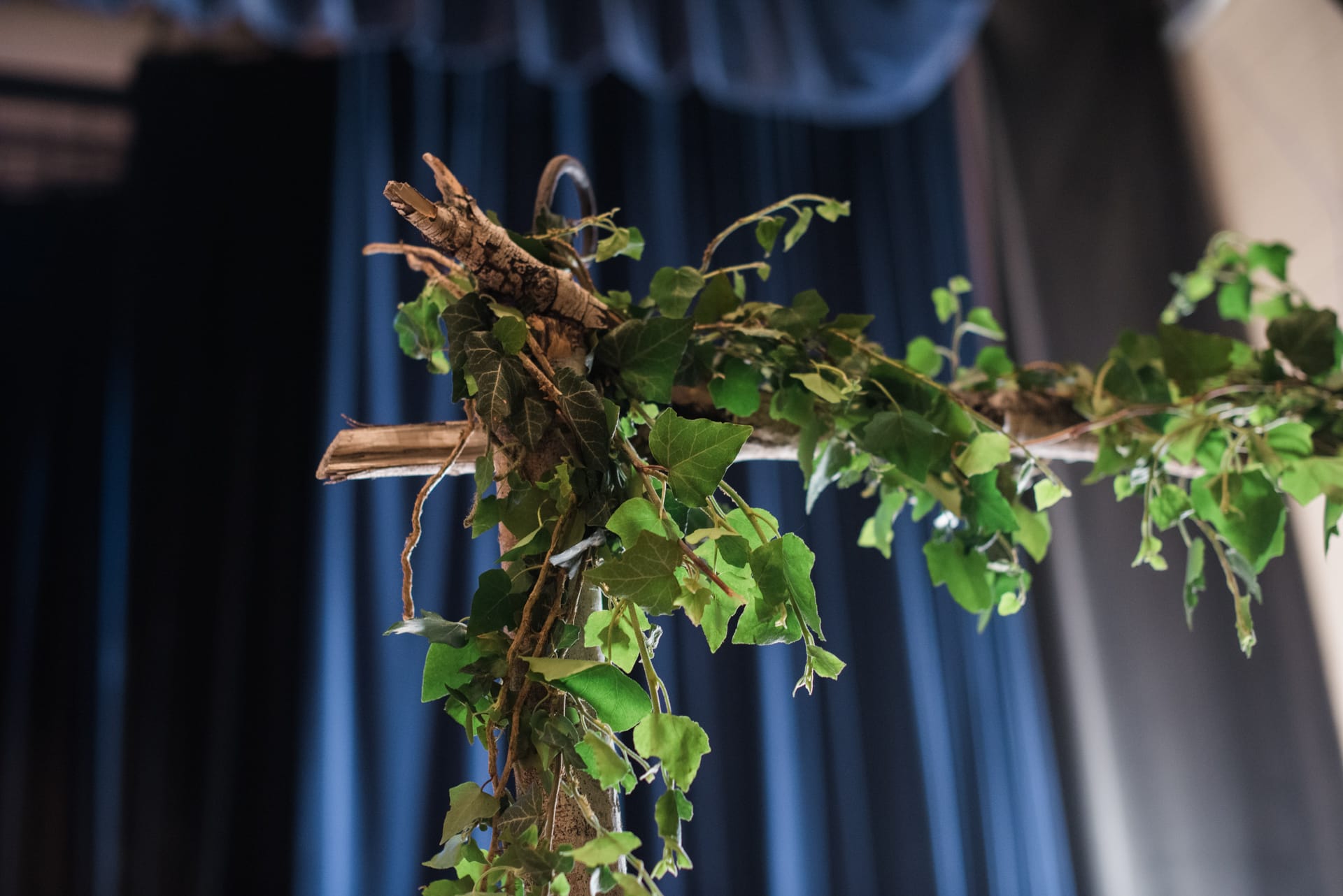 upclose of Denver Waldorf School Graduation Arch with branches and leaves